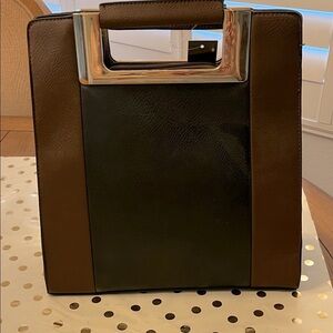 Stylish Black and Brown Handbag with Gold Accents